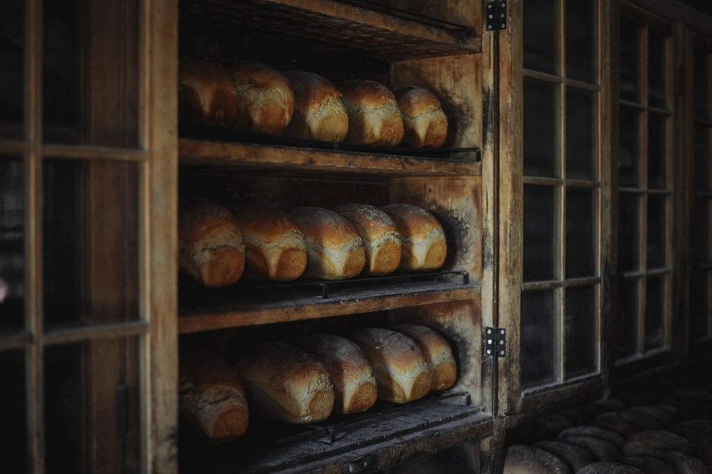 Loaves cooling on wooden racks